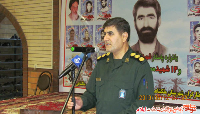 یادواره  چهارده  شهید محله بان باباخان شهرستان ملکشاهی و گرامیداشت پاسدار شهید کسعلی دربین